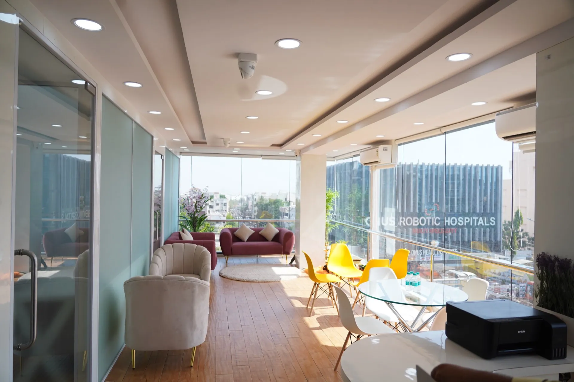 KOCOwork's community lounge and breakout seating area with a city view
